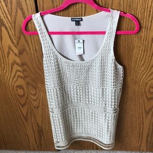 Express top…new size medium. Color tan.